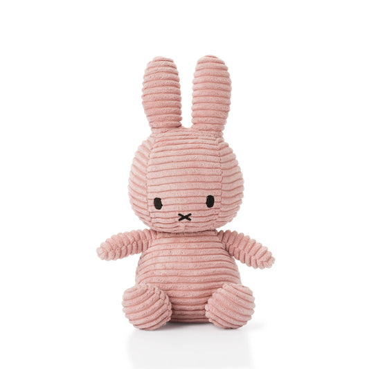 Miffy soft toy by Bon Ton toys - Miffy Corduroy in the colour pink. This Miffy has black eyes and nose. It is 23 cm in height. The background is white. 