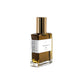 A glass bottle with a gold lid. The label is white with black text. The perfume is a dark gold colour. The bottle is shown at an angle to show the side of the label